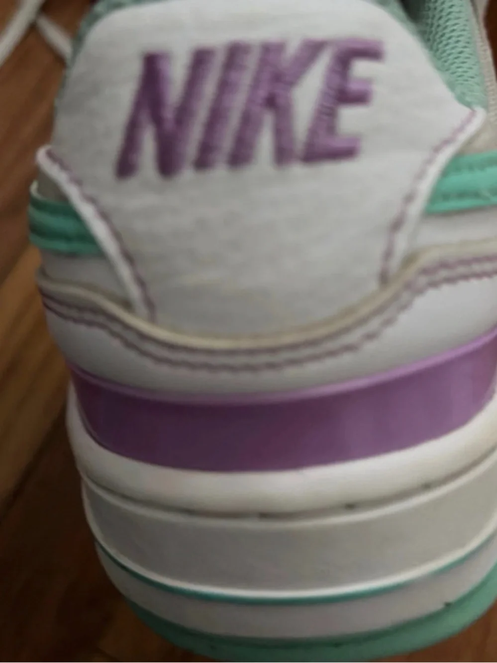 Nike Women's White Sneakers with Mint and Lavender Accents